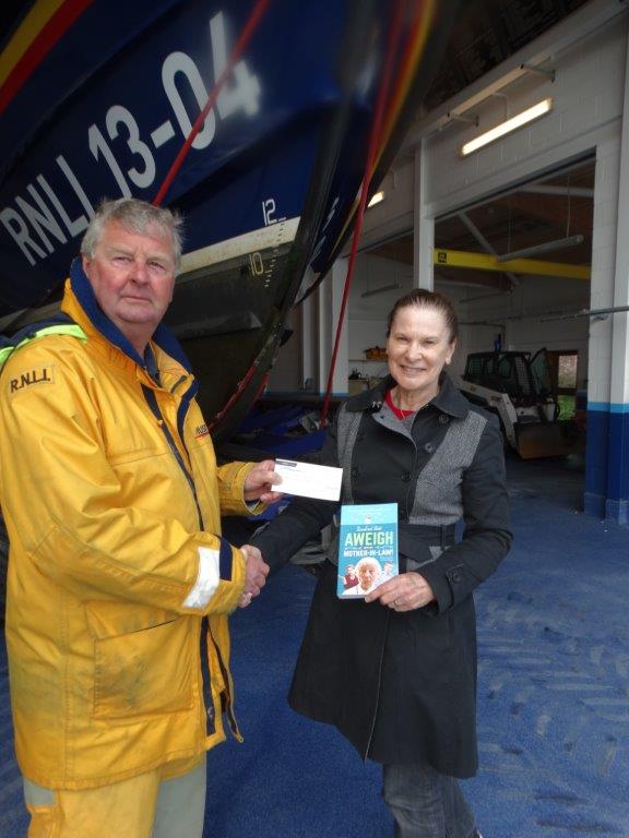Martin Rudwick being presented with the cheque by Rosalind Scott